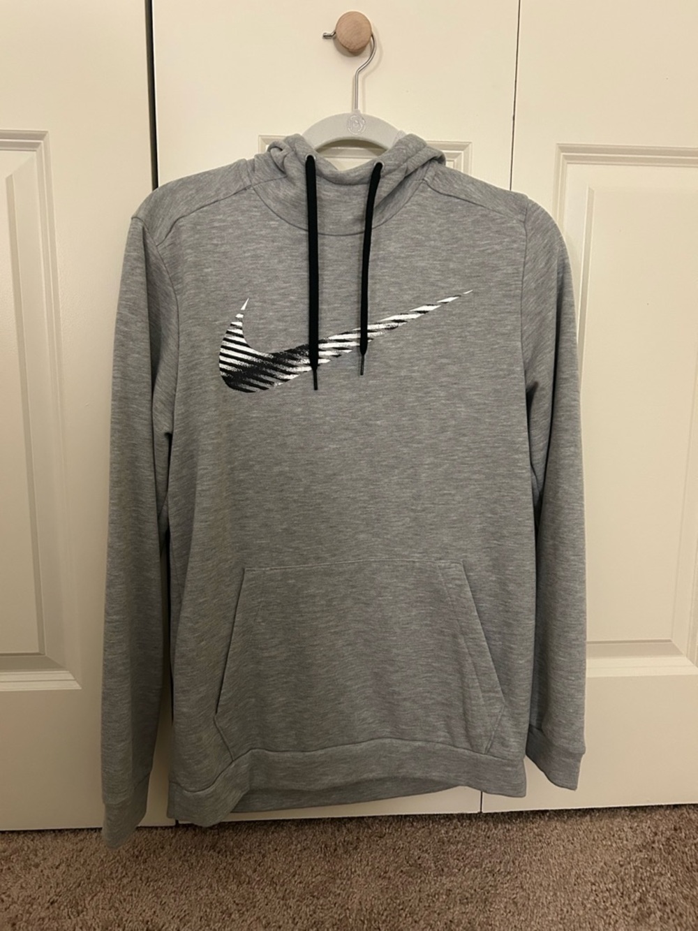Nike Women’s Gray Pullover Hoodie - Swoosh Logo